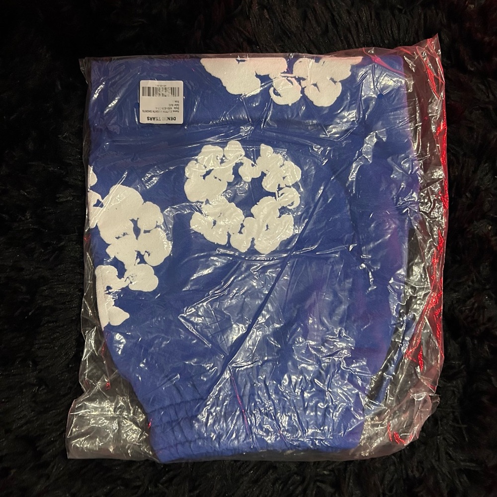 Denim Tears Blue Shorts with White Floral Design